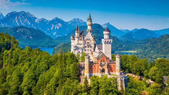 Famous Neuschwanstein Castle with its scenic mountain landscape